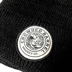 BLACK CROWDED BARREL BEANIE